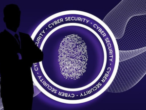 cybersecurity logo with a man standing in front of it